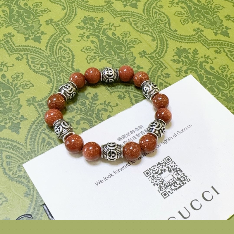 G*u*i bracelets